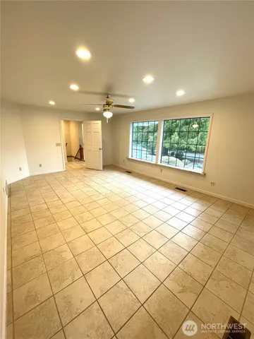 an empty room & utility room