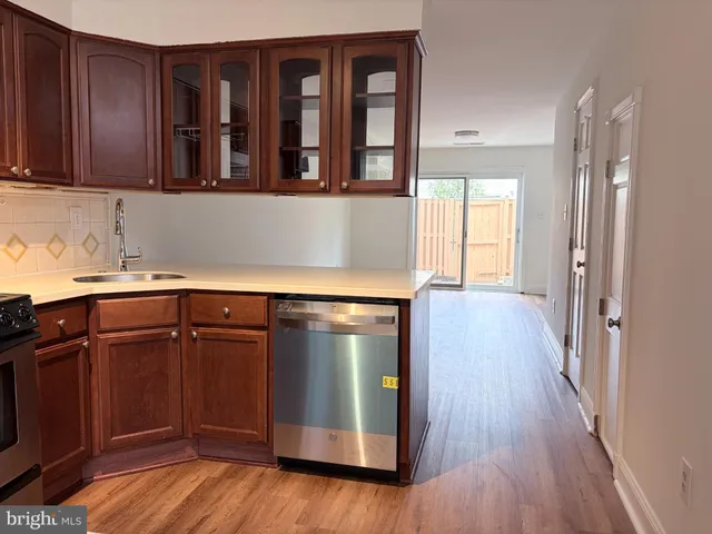 a view of cabinets and window