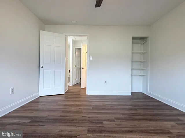 a bathroom with a bath tub a sink and a toilet