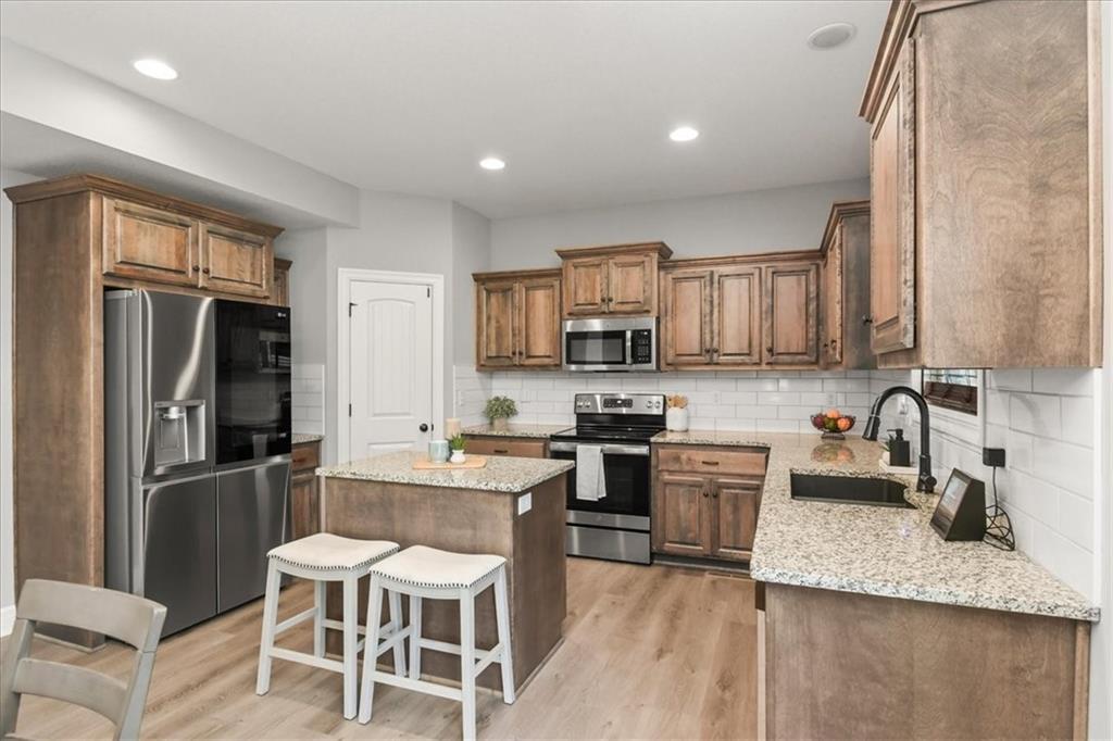 801 Northwest Hickory Ridge Drive Grain Valley, MO 64029 - Photo 10 of 32
