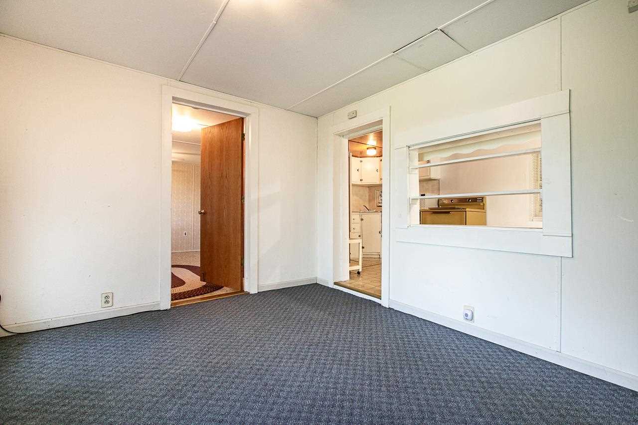 4798 South River Road Hanover, IL 61041 - Photo 2 of 14 a view of an empty room with a window