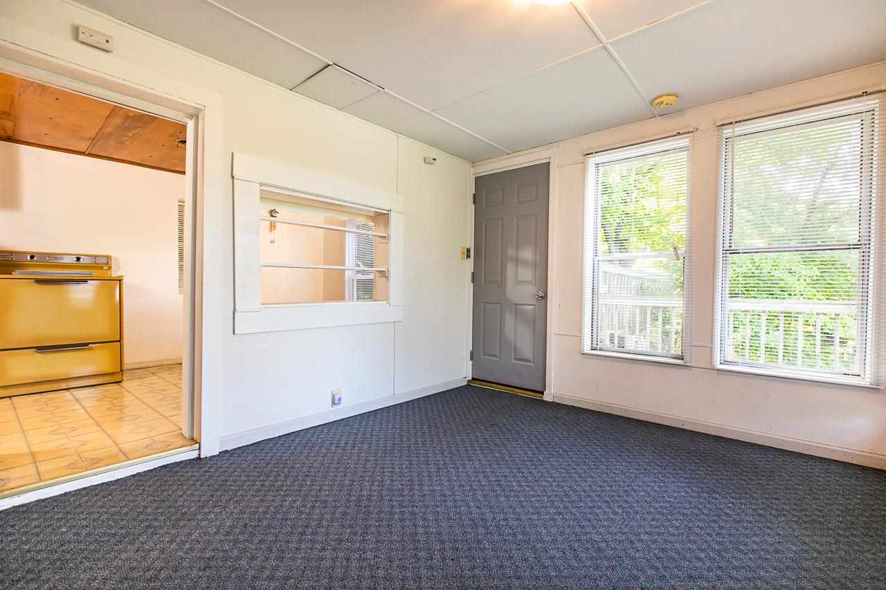 4798 South River Road Hanover, IL 61041 - Photo 3 of 14 a view of an empty room with a window