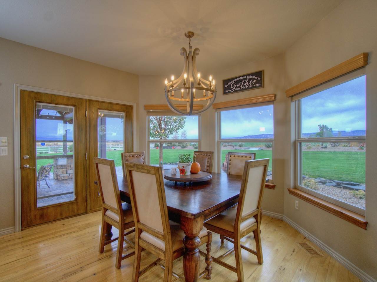 1516 13 Road Loma, CO 81524 - Photo 15 of 32 a view of a dining room with furniture a chandelier and wooden floor