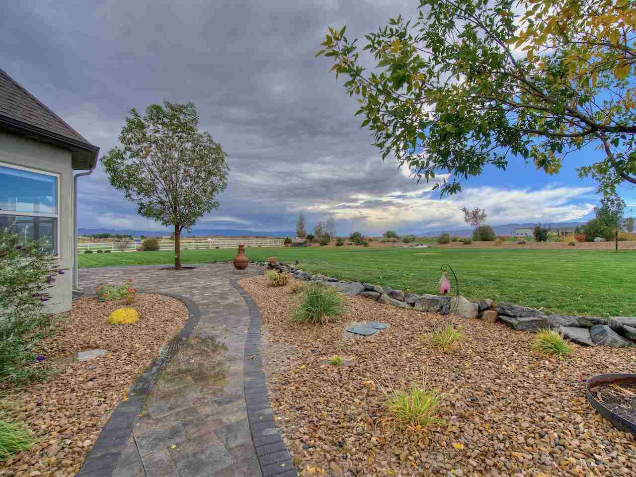 1516 13 Road Loma, CO 81524 - Photo 8 of 32 a view of a garden with a tree