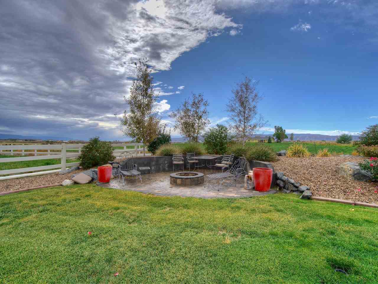 1516 13 Road Loma, CO 81524 - Photo 9 of 32 a view of a backyard with sitting area