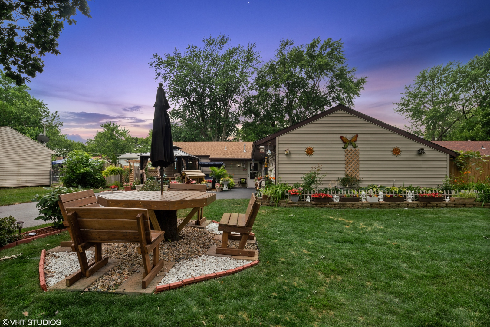 171 Seabury Road Bolingbrook, IL 60440 - Photo 1 of 13 a view of backyard of house with outdoor seating and green space