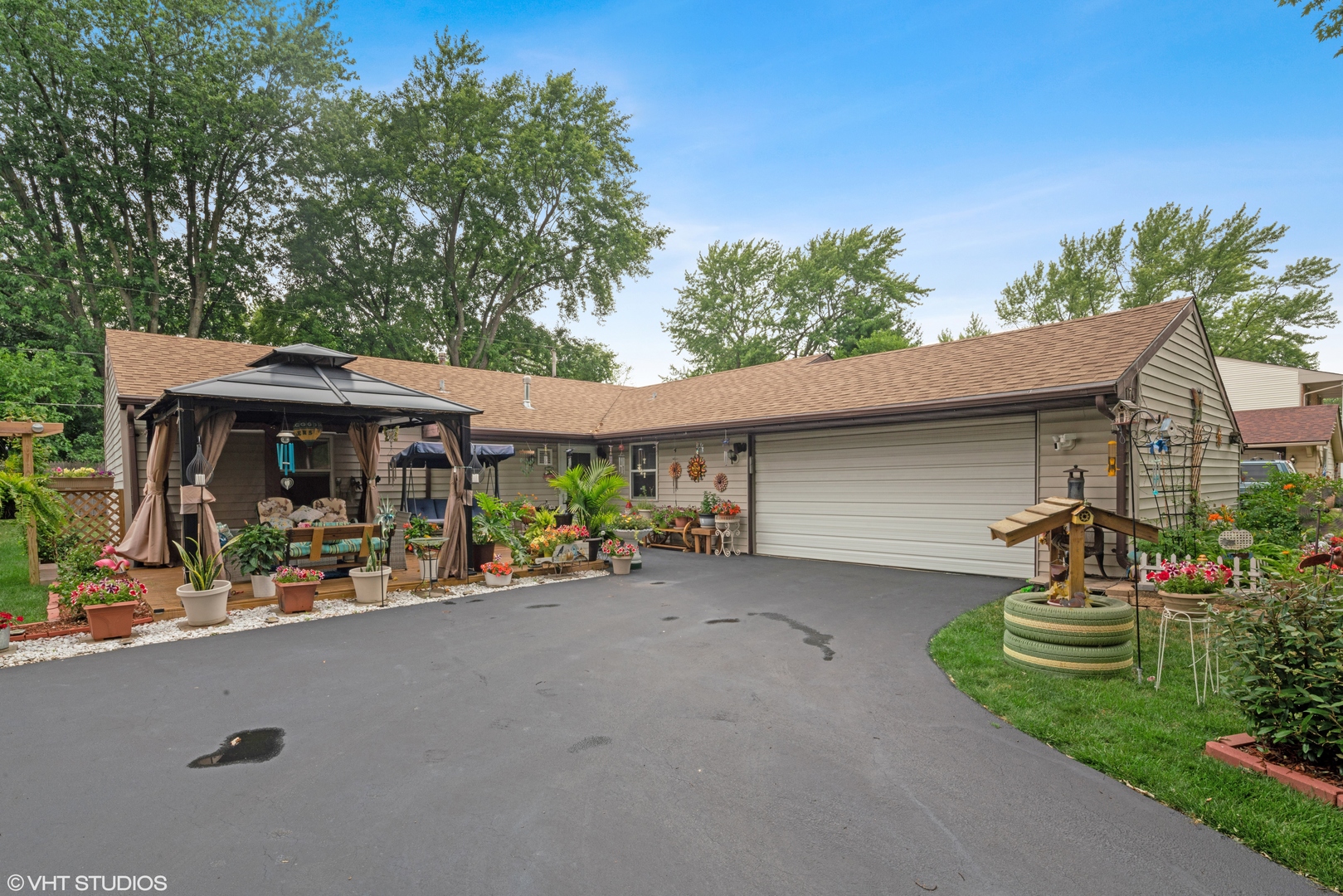 171 Seabury Road Bolingbrook, IL 60440 - Photo 2 of 13 a view of a house with a yard and sitting area