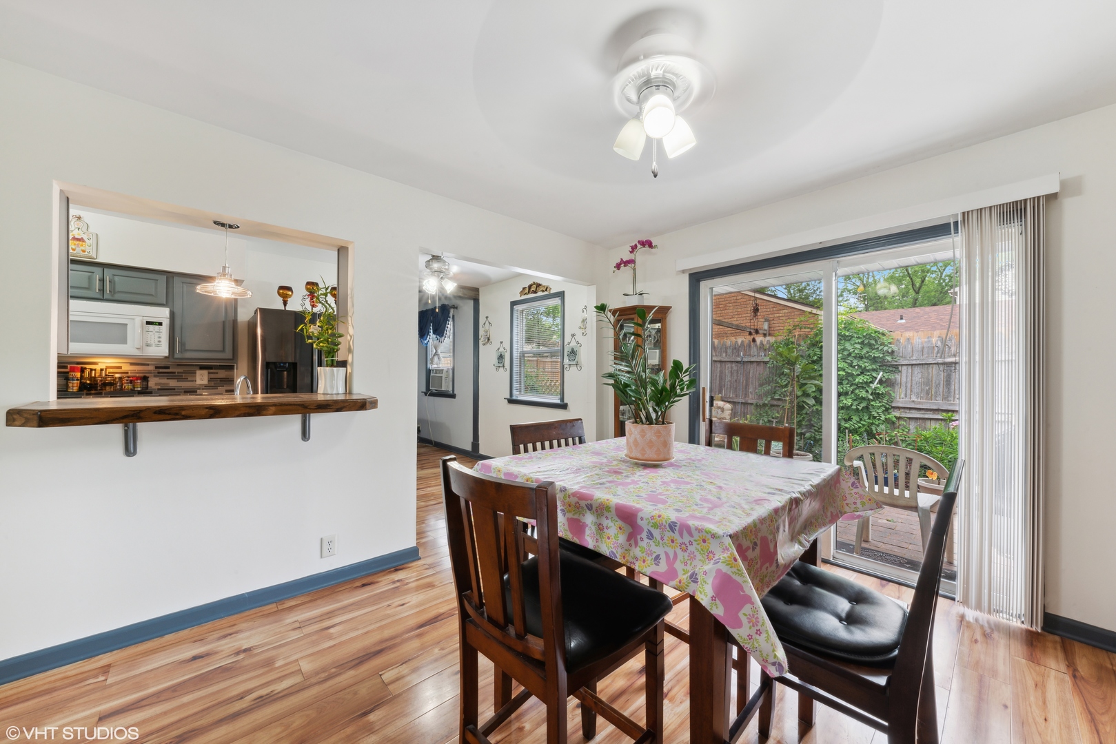 171 Seabury Road Bolingbrook, IL 60440 - Photo 4 of 13 a view of a dining room with furniture window and wooden floor