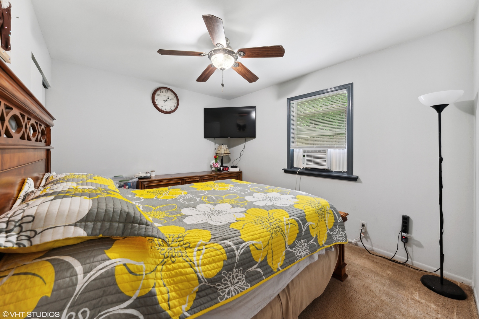 171 Seabury Road Bolingbrook, IL 60440 - Photo 8 of 13 a bedroom with a bed and a flat tv screen
