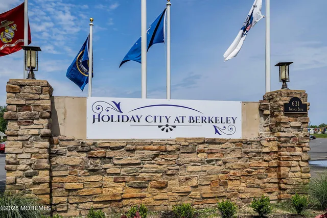 a view of a patio with couches and a flat tv screen