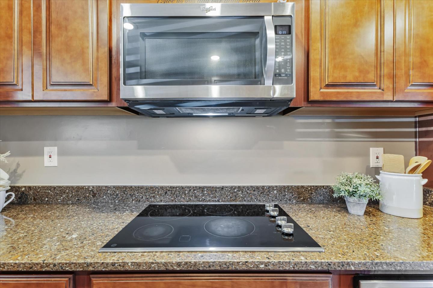 363 River View Drive San Jose, CA 95111 - Photo 17 of 41 a kitchen with granite countertop a sink and a stove