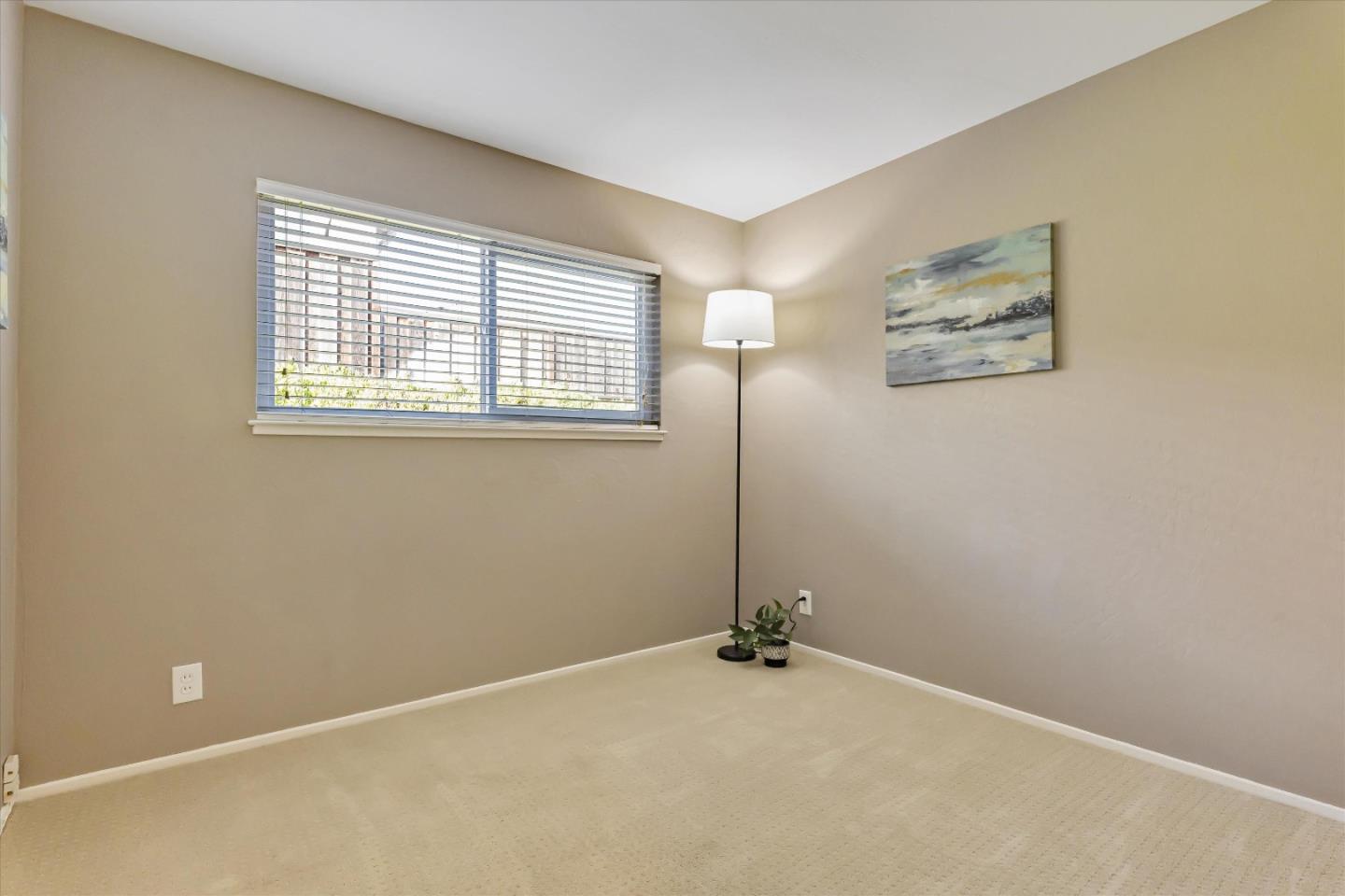 363 River View Drive San Jose, CA 95111 - Photo 21 of 41 a view of an empty room with a window