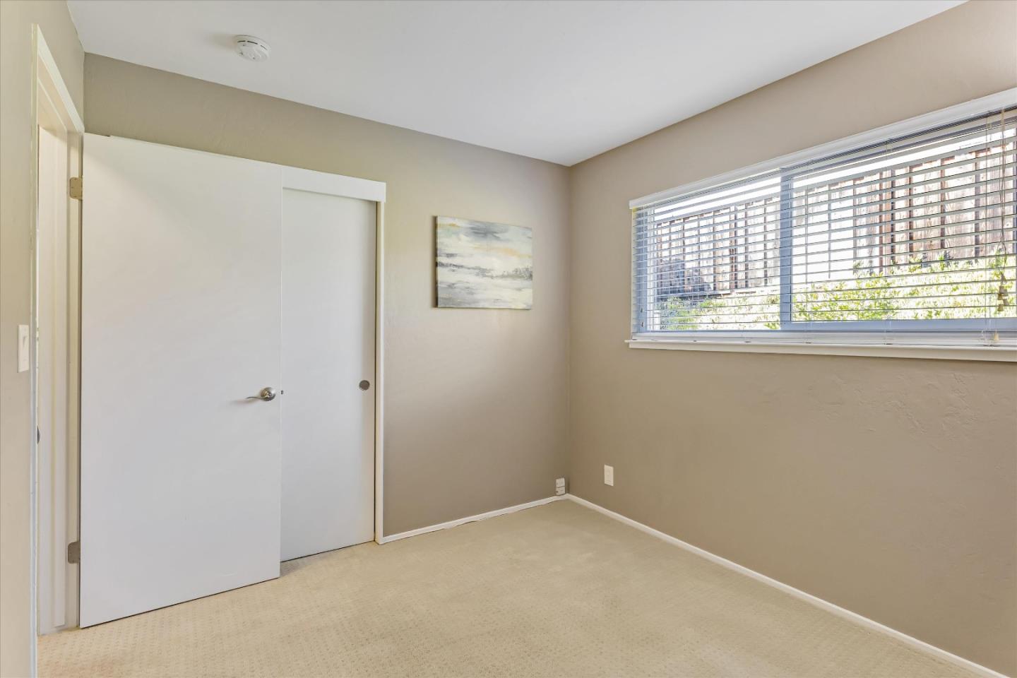 363 River View Drive San Jose, CA 95111 - Photo 22 of 41 a view of an empty room with a window