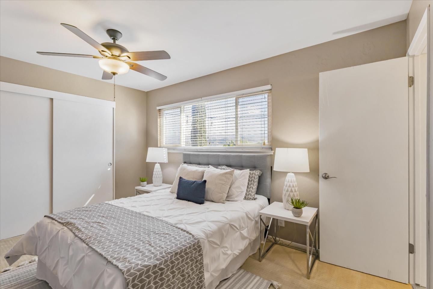 363 River View Drive San Jose, CA 95111 - Photo 25 of 41 a bedroom with a bed and window