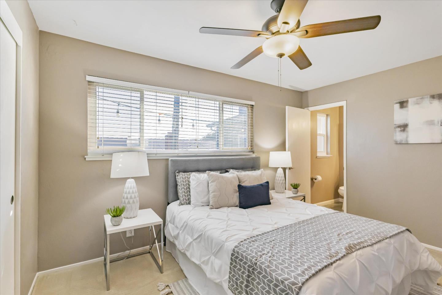 363 River View Drive San Jose, CA 95111 - Photo 26 of 41 a bedroom with a bed and a window