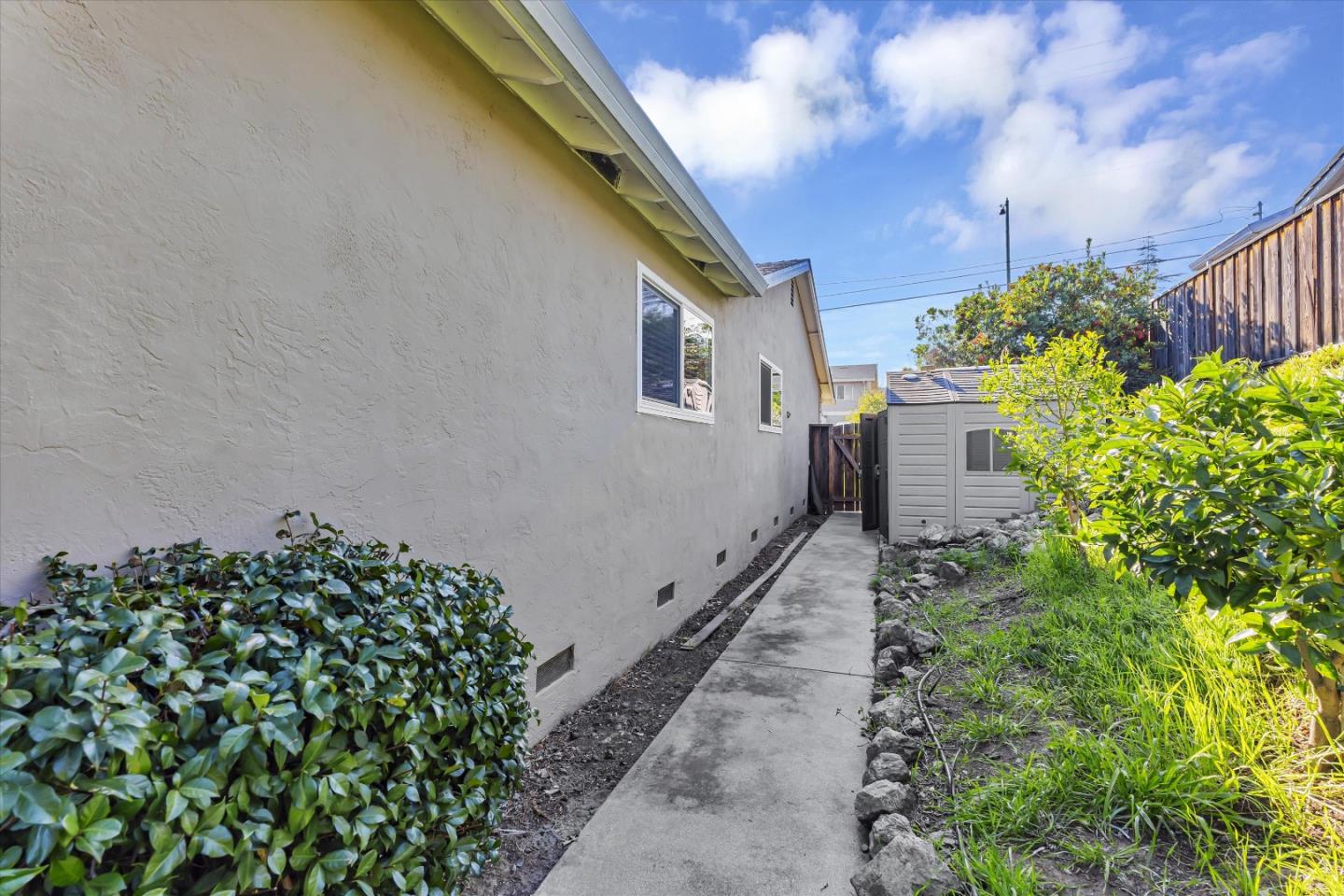 363 River View Drive San Jose, CA 95111 - Photo 37 of 41 a backyard of a house with lots of green space