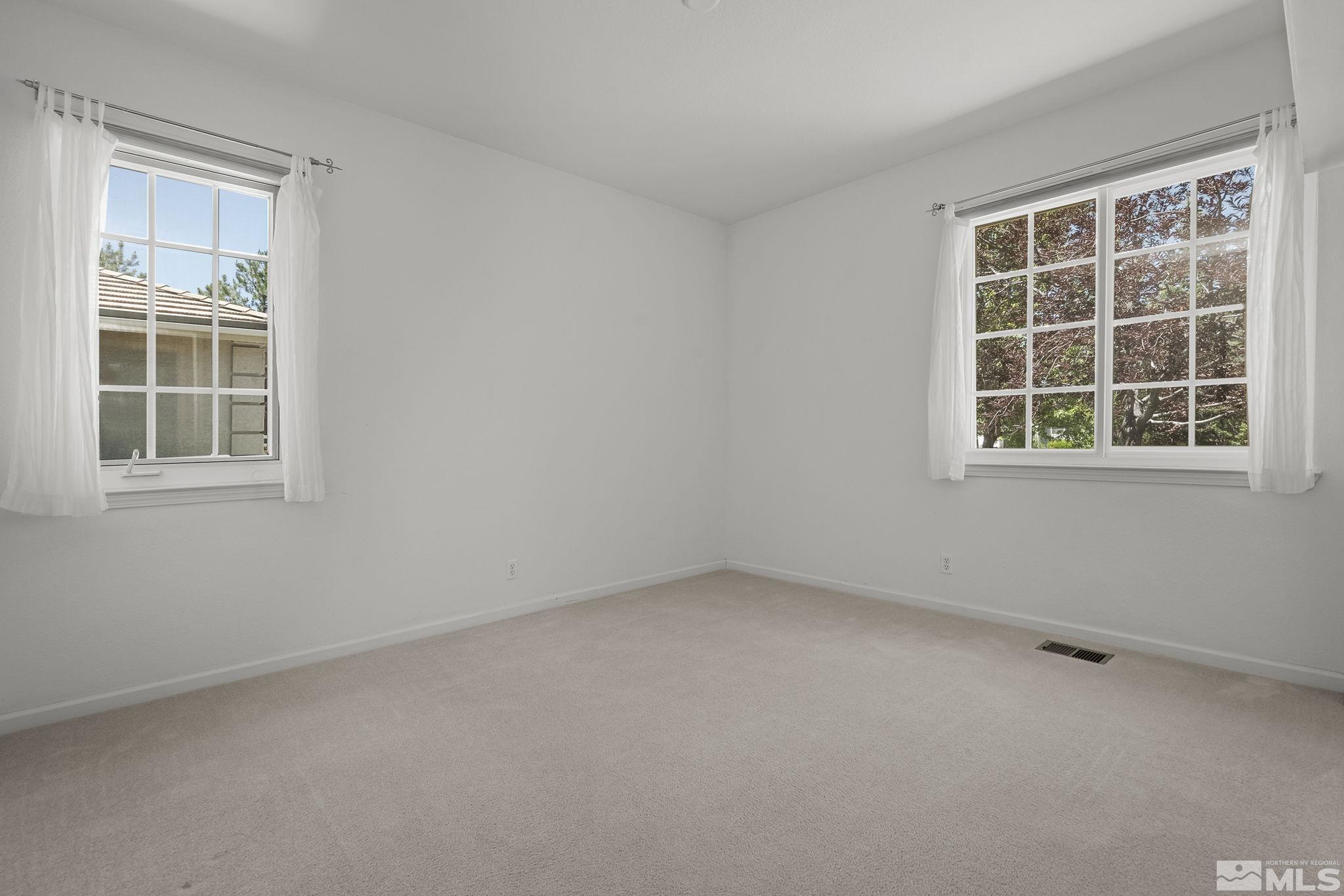820 Flanders Road Reno, NV 89511 - Photo 26 of 40 an empty room with a window