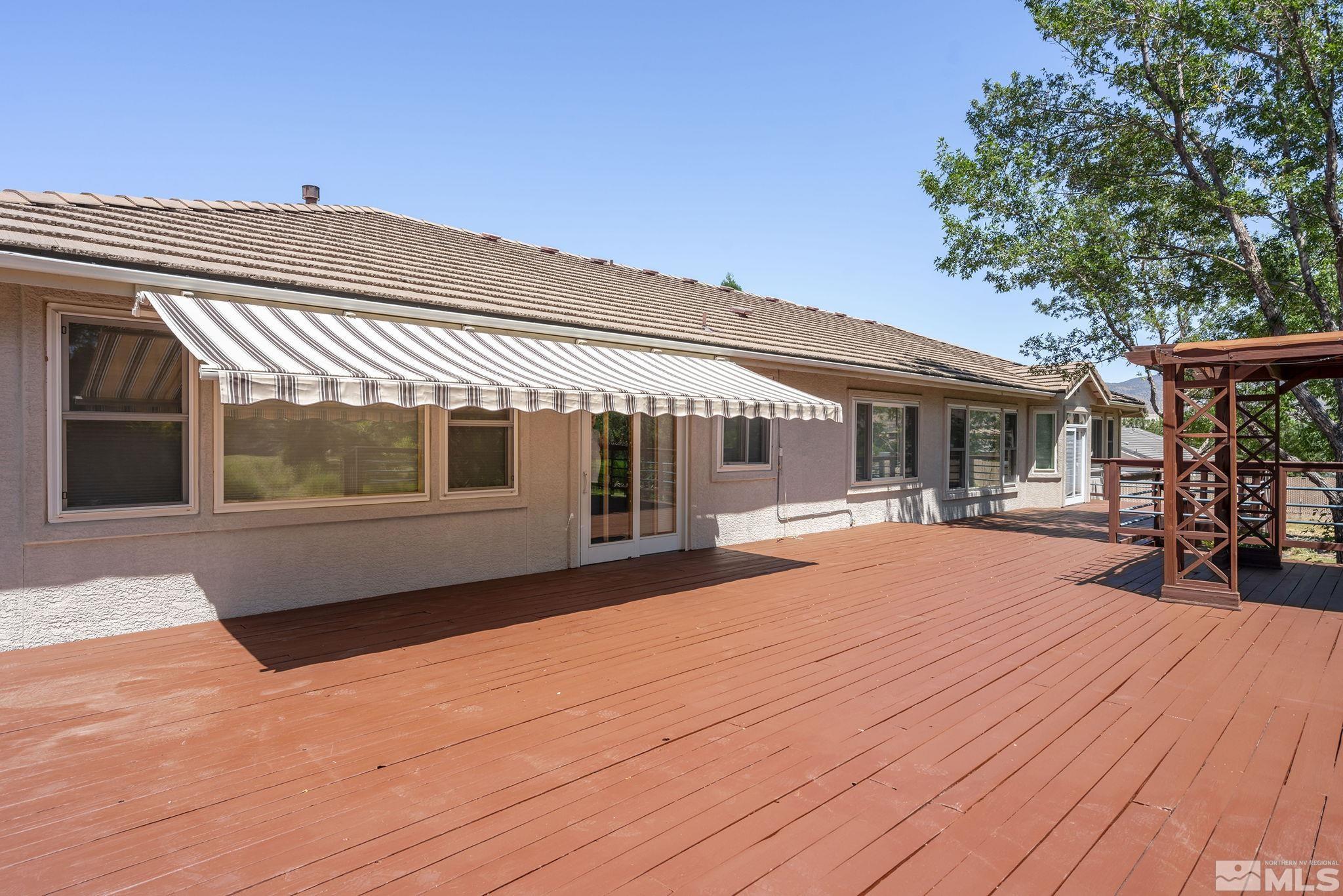 820 Flanders Road Reno, NV 89511 - Photo 33 of 40 a front view of a house with a yard