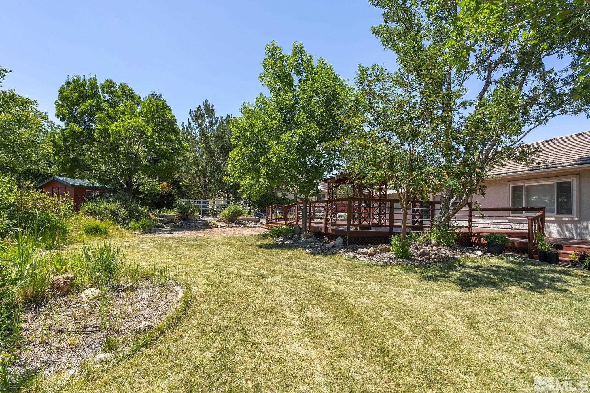 820 Flanders Road Reno, NV 89511 - Photo 36 of 40 a view of a house with a yard