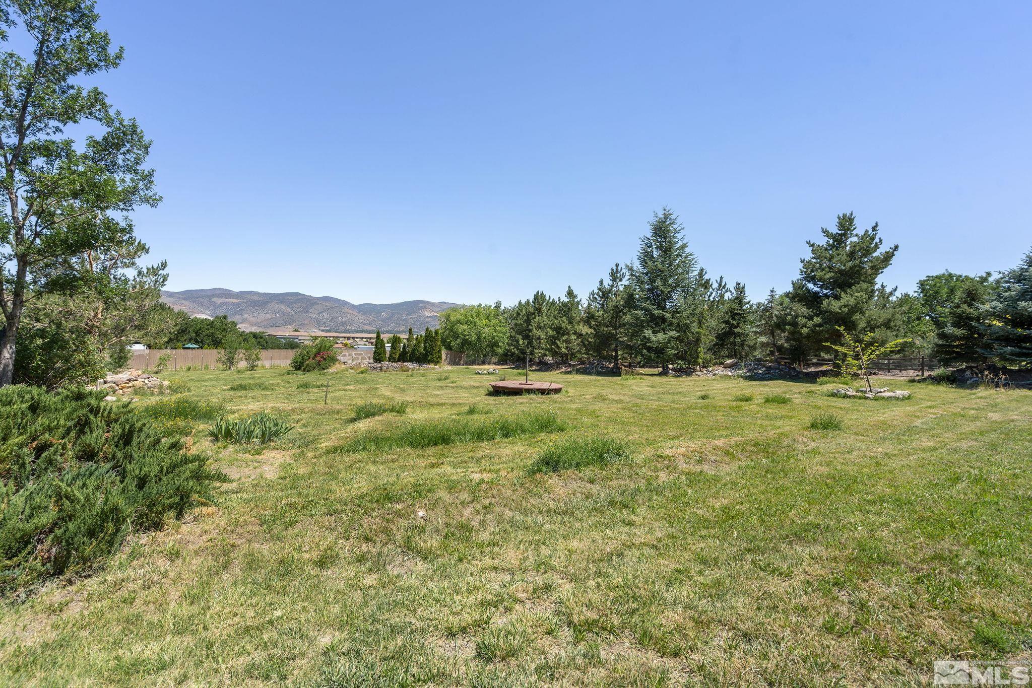 820 Flanders Road Reno, NV 89511 - Photo 38 of 40 a view of an outdoor space and a yard