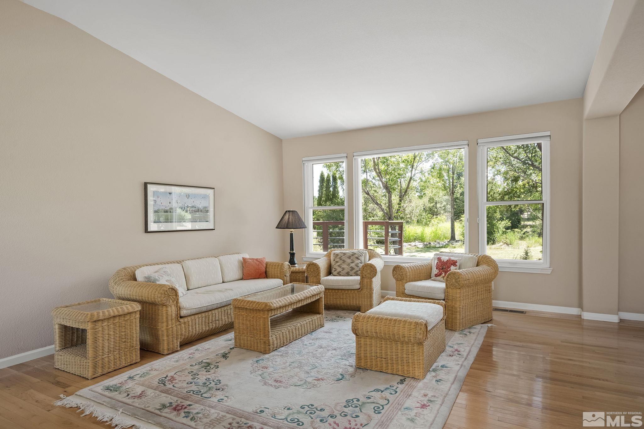 820 Flanders Road Reno, NV 89511 - Photo 6 of 40 a living room with furniture and a large window