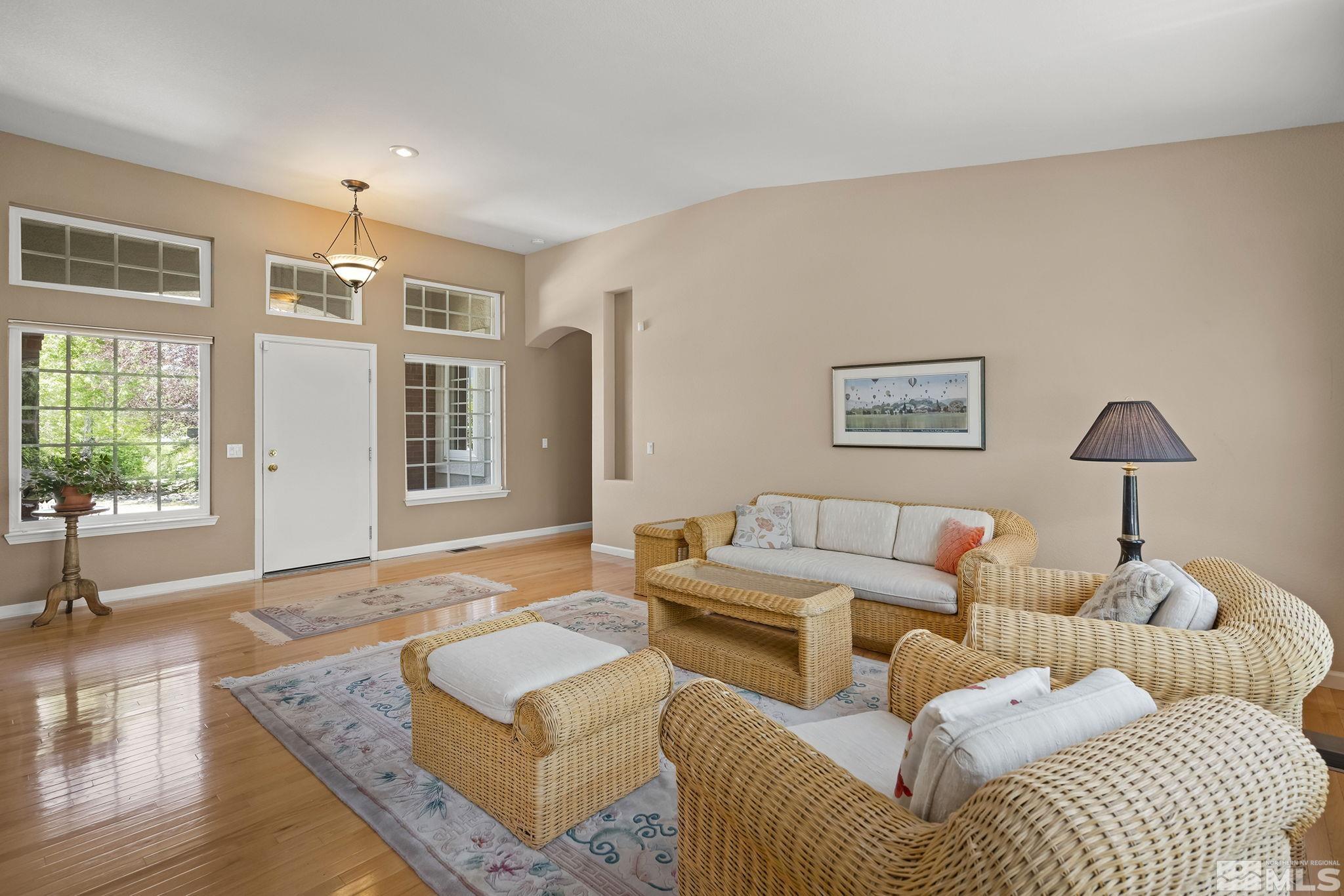 820 Flanders Road Reno, NV 89511 - Photo 7 of 40 a living room with furniture and a large window