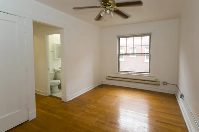 a view of an empty room and window