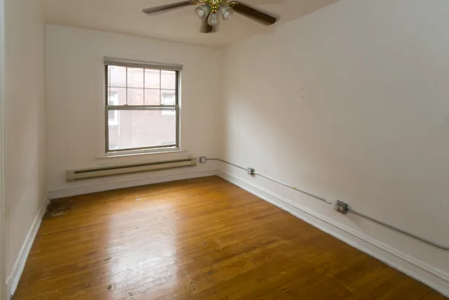 an empty room with windows