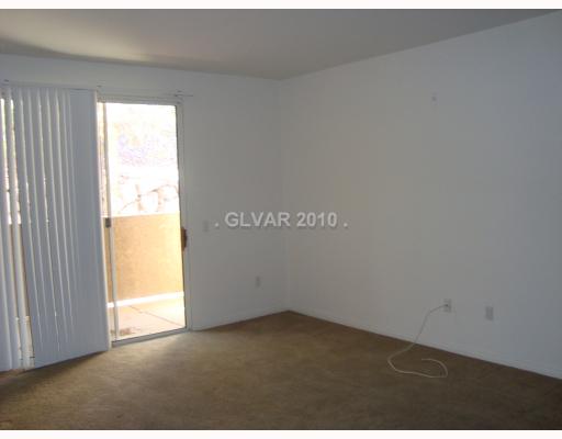 231 West Horizon Ridge Parkway, Unit 718 Henderson, NV 89012 - Photo 6 of 9 Living Room.