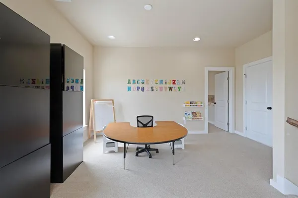 a living room with furniture and a table