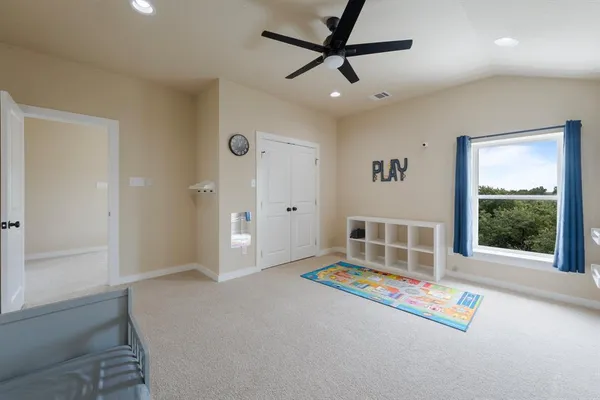 a living room with couch and a window