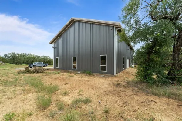 a view of backyard of house