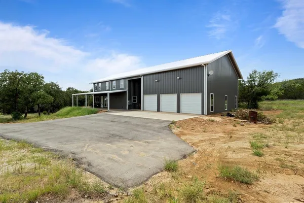 a view of backyard of a house