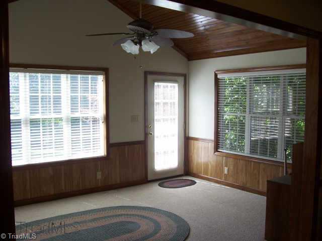 8396 Coachman Lane Rural Hall, NC 27045 - Photo 5 of 9 Other. 11x15 sunroom just off livingroom with beautiful beaded board ceiling.