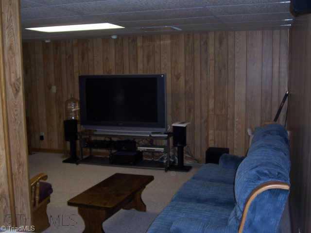 8396 Coachman Lane Rural Hall, NC 27045 - Photo 6 of 9 Other. Den/playroom area in basement. 55 inch Sony HDTV seller will consider leaving with acceptable offer.