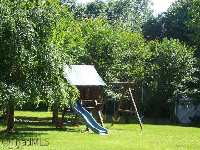 8396 Coachman Lane Rural Hall, NC 27045 - Photo 8 of 9 Other. Peaceful back yard with playset for the kids.