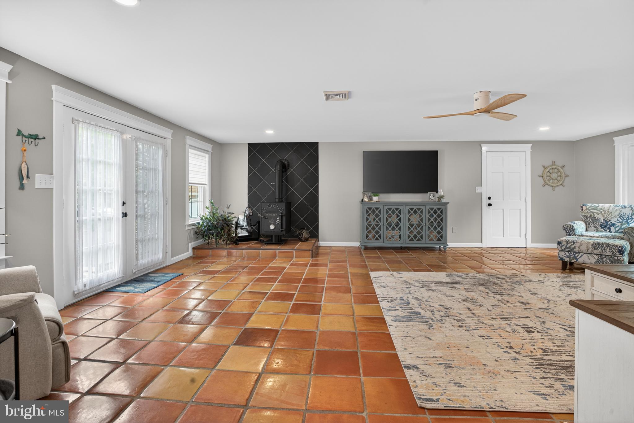 31345 Oak Street Ocean View, DE 19970 - Photo 19 of 49 EXPANSIVE FAMILY ROOM WITH WOOD STOVE