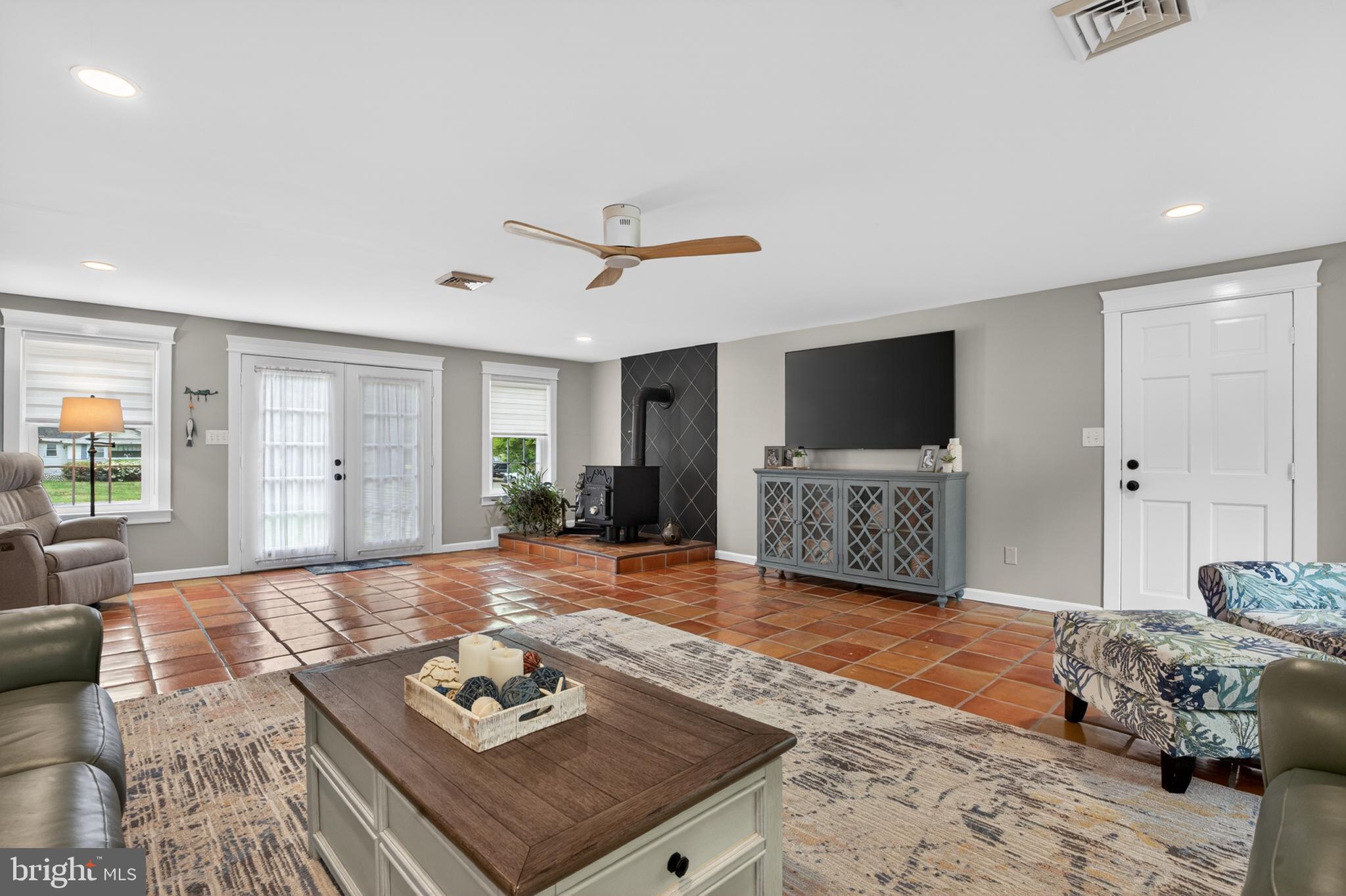 31345 Oak Street Ocean View, DE 19970 - Photo 21 of 49 EXPANSIVE FAMILY ROOM WFRENCH DOORS TO PAVER PATIO