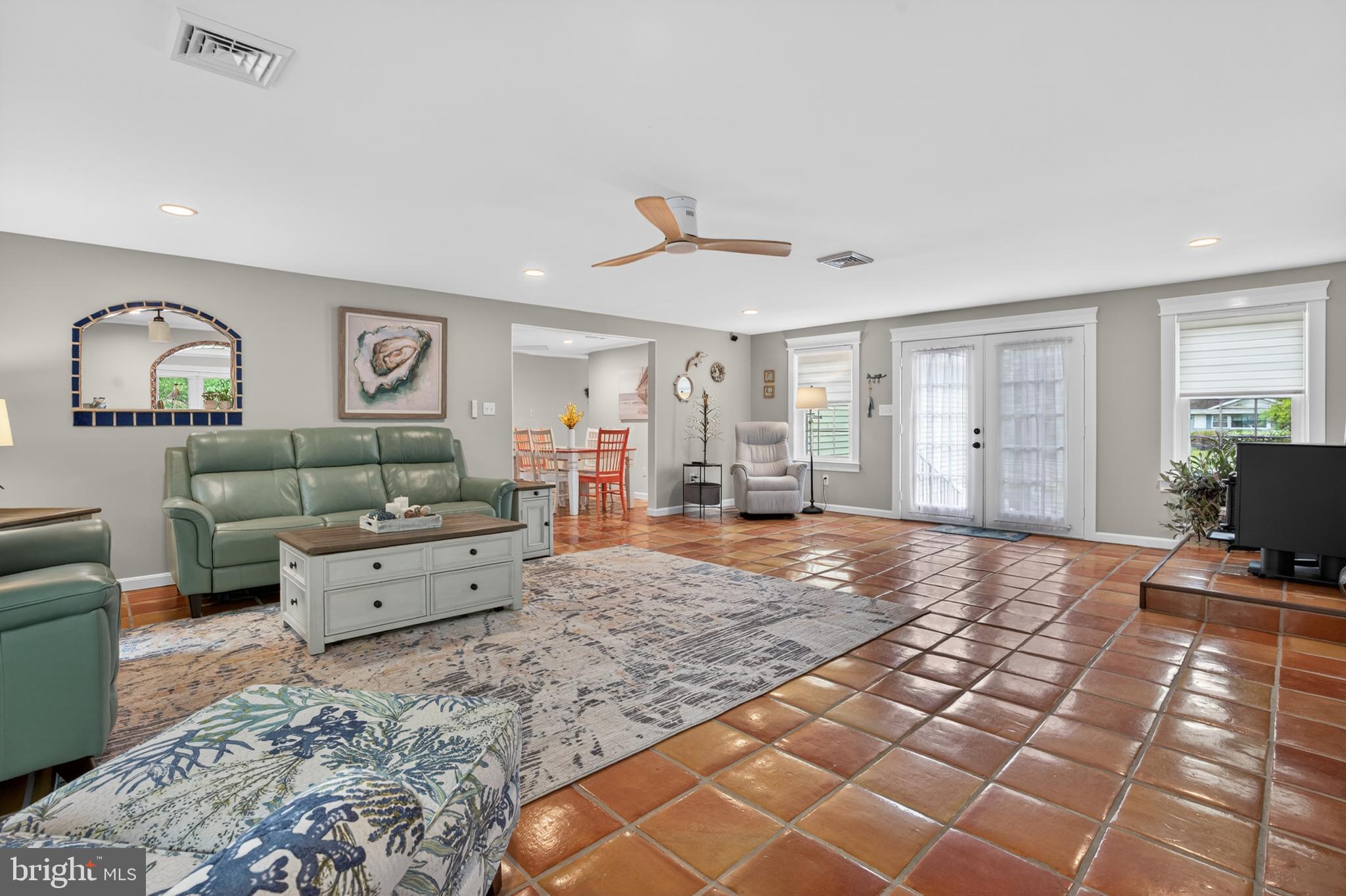 31345 Oak Street Ocean View, DE 19970 - Photo 22 of 49 EXPANSIVE FAMILY ROOM WFRENCH DOORS TO PAVER PATIO