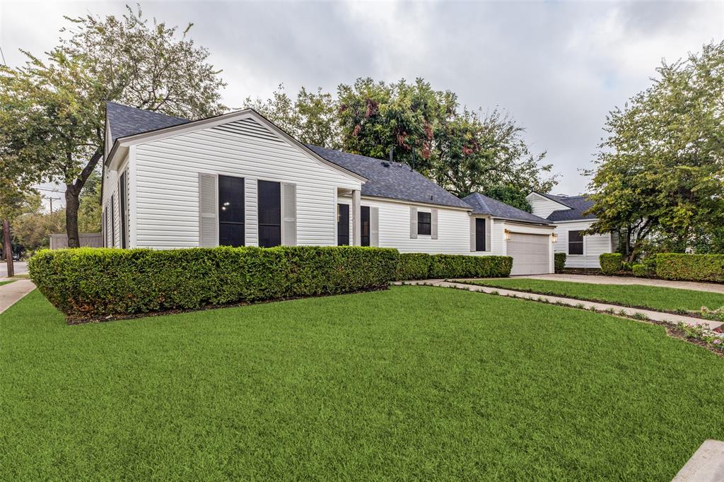 5848 Kenwood Avenue Dallas, TX 75206 - Photo 1 of 32 a front view of a house with a yard