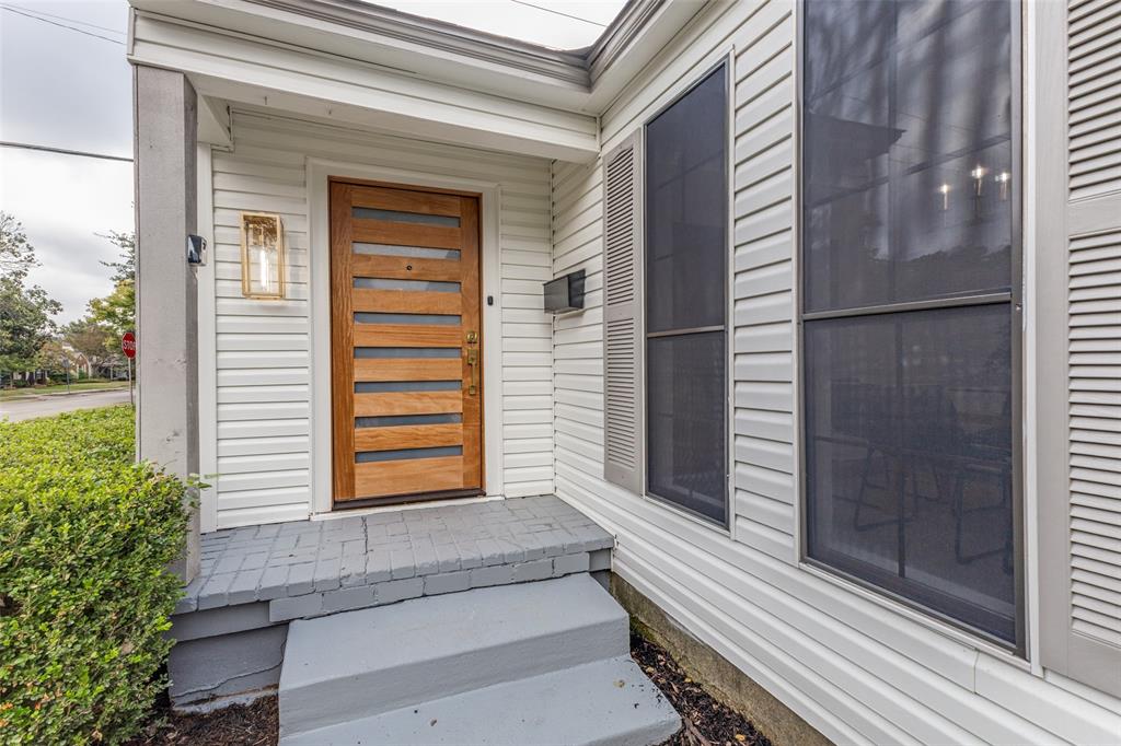 5848 Kenwood Avenue Dallas, TX 75206 - Photo 2 of 32 a front view of a house with a yard