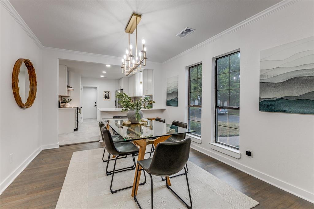 5848 Kenwood Avenue Dallas, TX 75206 - Photo 9 of 32 a dining room with furniture and window