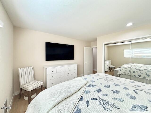 3725 Sunset Lane Oxnard, CA 93035 - Photo 19 of 22 a bedroom with a bed and a flat screen tv