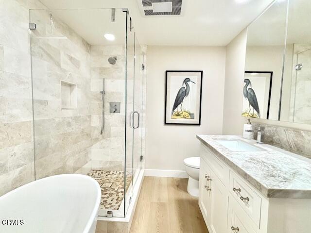 3725 Sunset Lane Oxnard, CA 93035 - Photo 20 of 22 a bathroom with a granite countertop sink a toilet and shower