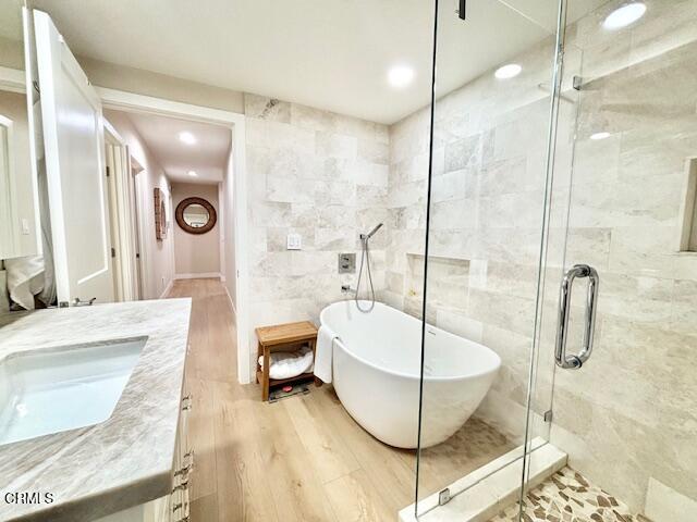 3725 Sunset Lane Oxnard, CA 93035 - Photo 21 of 22 a bathroom with a tub a sink and a shower