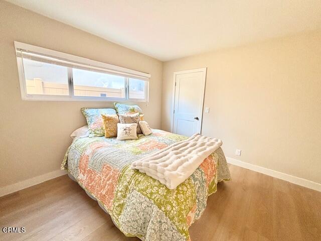 3725 Sunset Lane Oxnard, CA 93035 - Photo 22 of 22 a bedroom with a bed and a window
