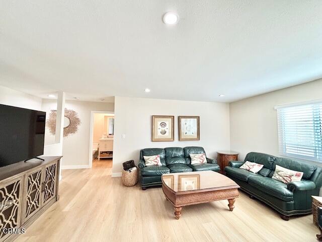 3725 Sunset Lane Oxnard, CA 93035 - Photo 5 of 22 a living room with furniture and a flat screen tv