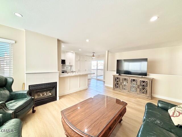 3725 Sunset Lane Oxnard, CA 93035 - Photo 6 of 22 a living room with furniture and a flat screen tv