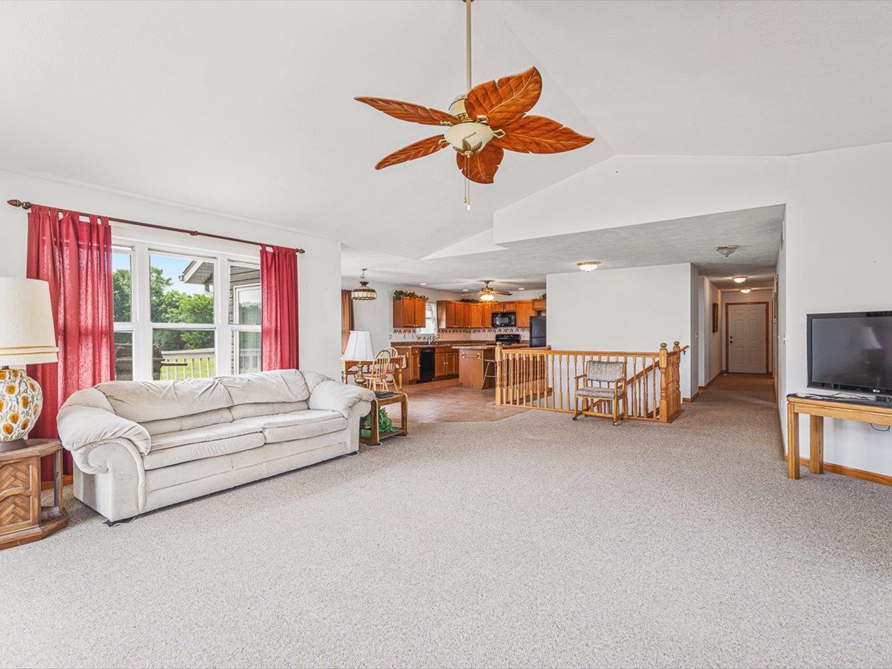 1106 Drexel Road Lake Summerset, IL 61019 - Photo 11 of 43 a living room with furniture and a flat screen tv