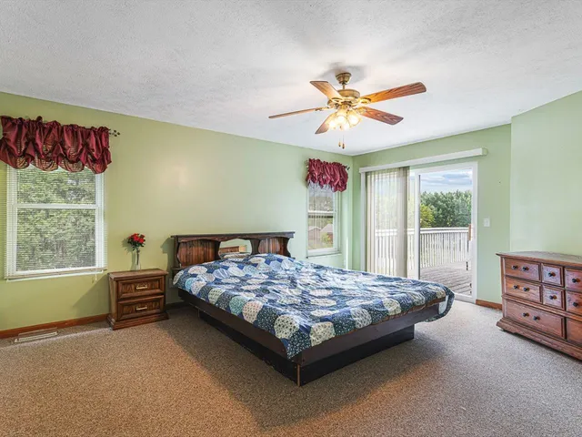 a white bath tub sitting next to a white sink
